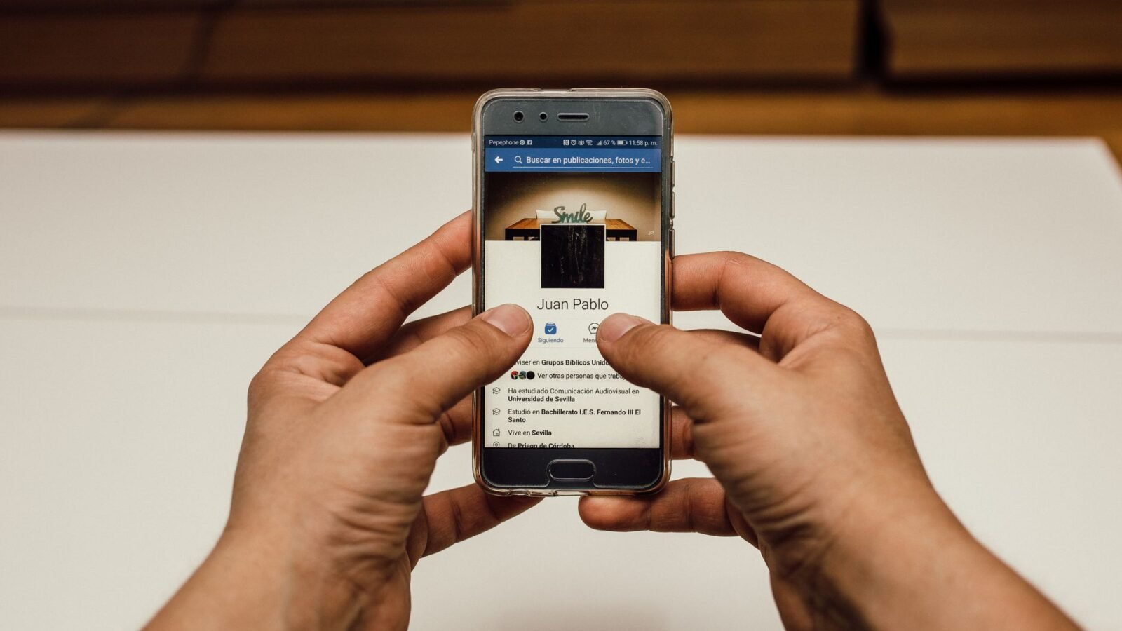 person holding silver smartphone